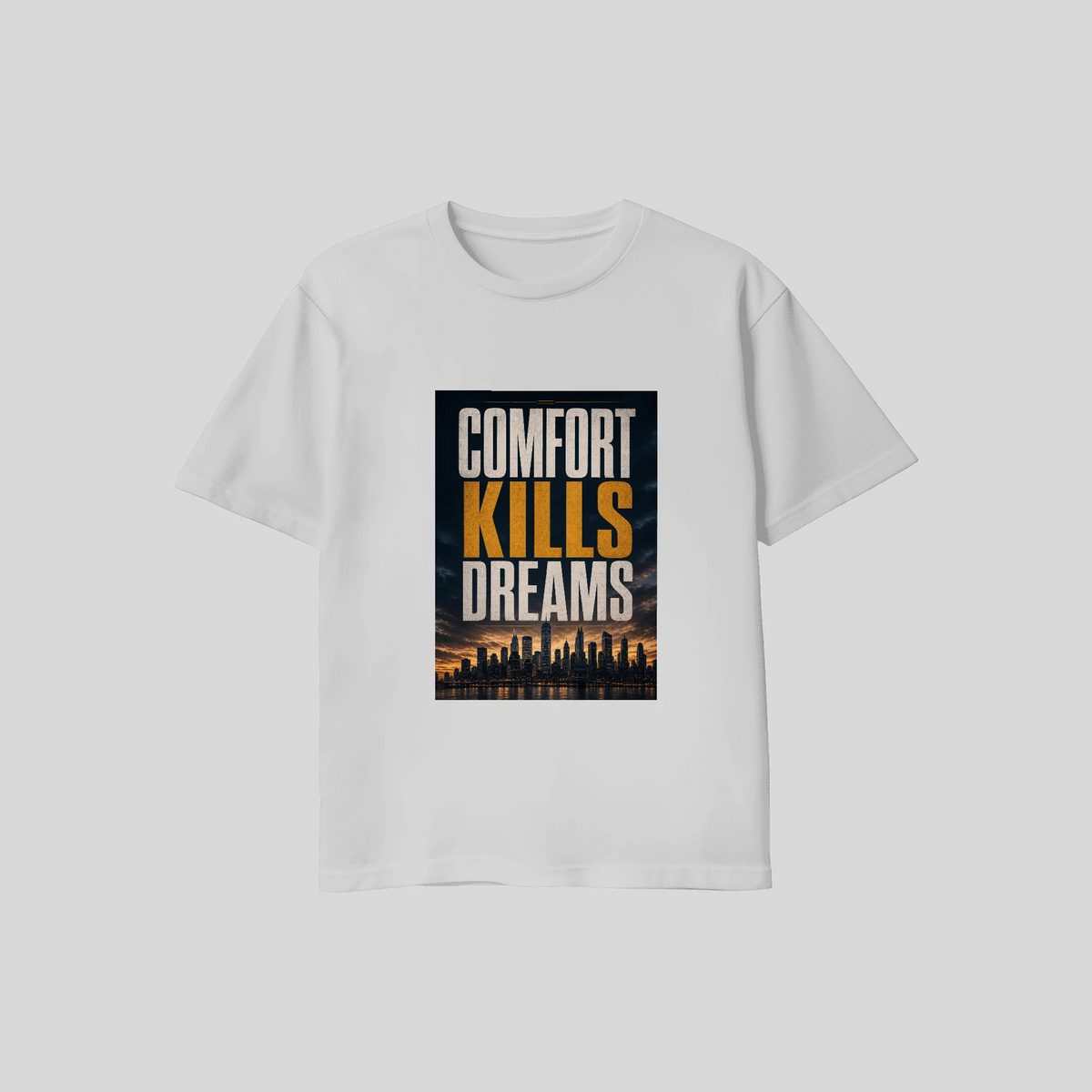 Comfort Kills Dreams tee in light gray, flat lay with the city skyline poster print