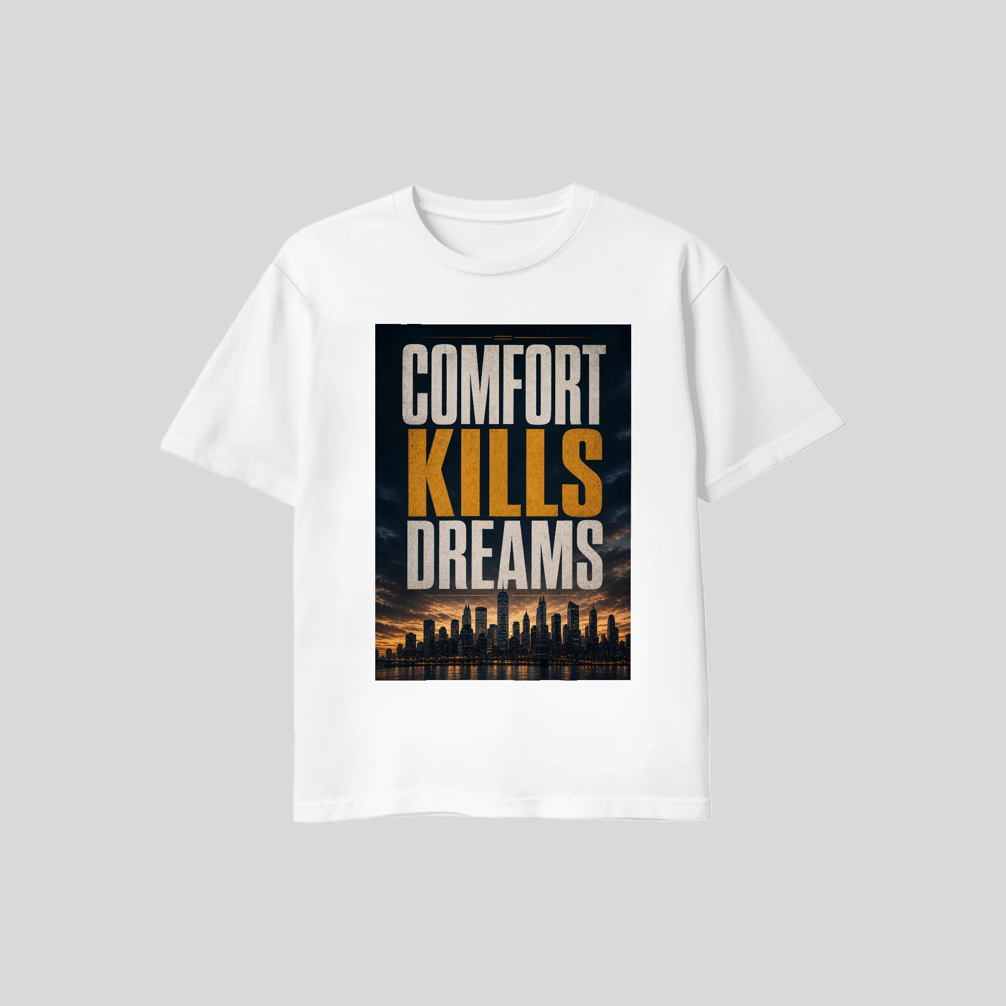 Comfort Kills Dreams tee in white, laid flat, close view of the orange and white skyline graphic