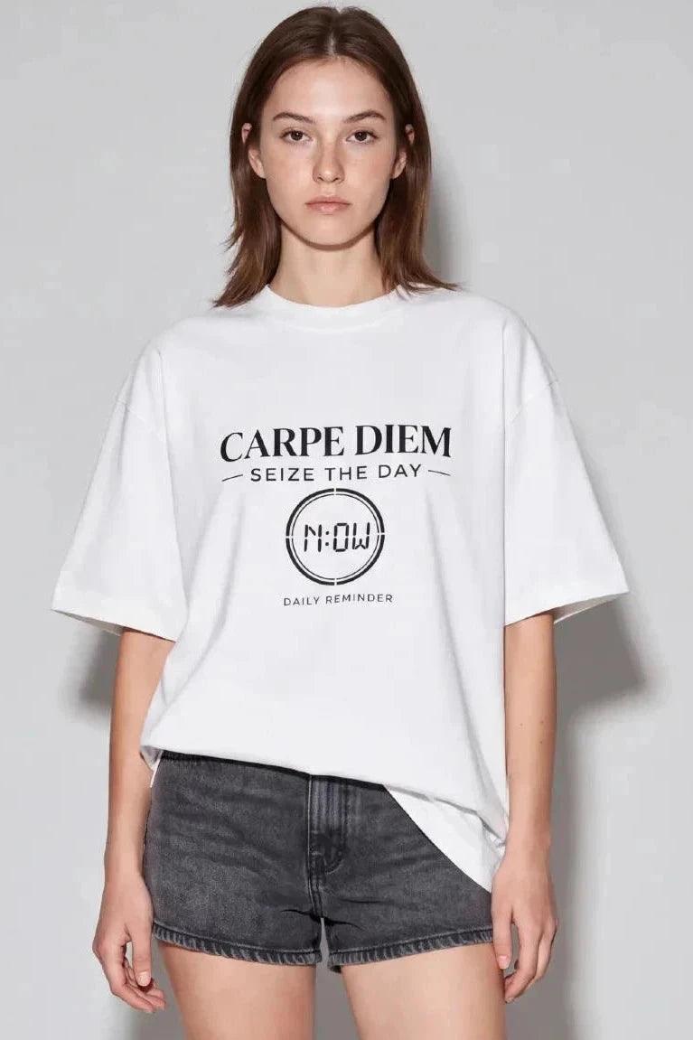 Model wearing a white Carpe Diem tee with “Seize the Day” text and a clock set to now