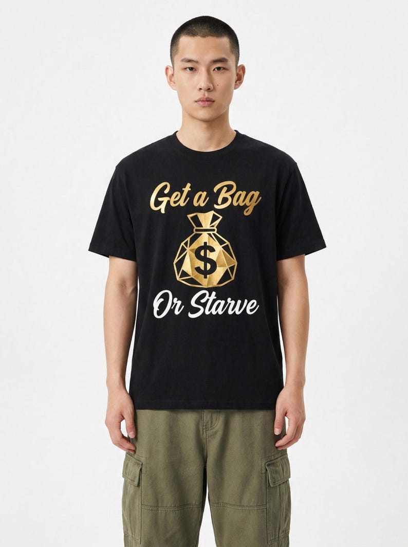 Model wearing the Get a Bag or Starve tee in black with the gold money bag graphic